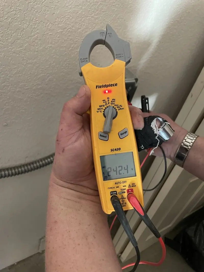 Voltage testing with clamp meter during Hot Tub / Pool Electrical Wiring in Easton